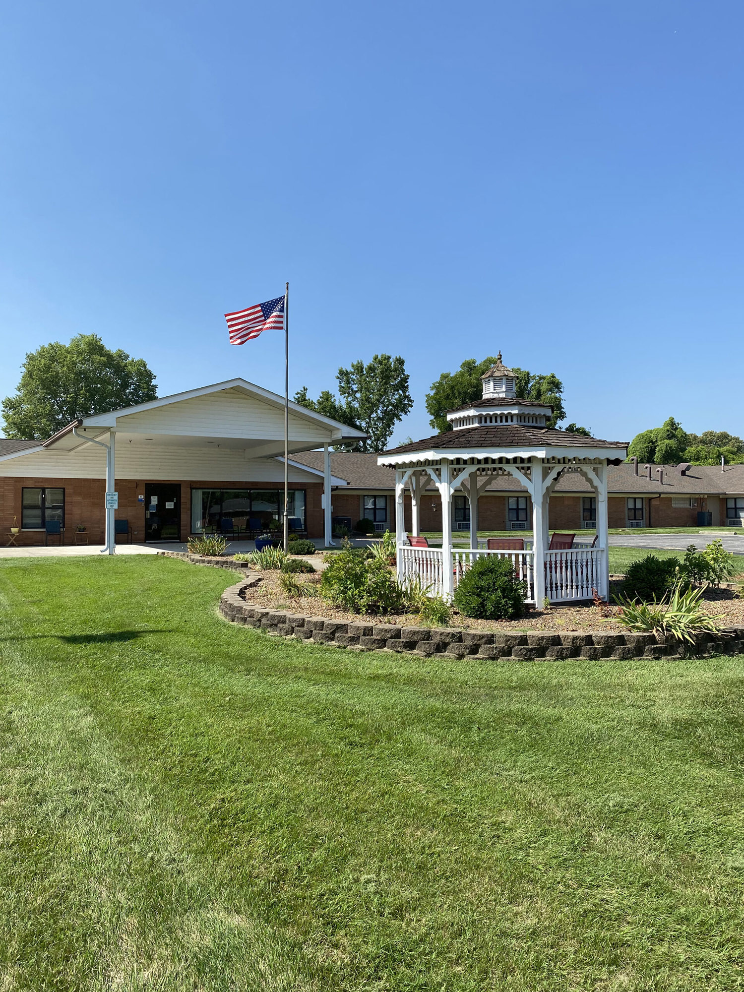 Brickyard Healthcare Petersburg Care Center exterior entrance and patio