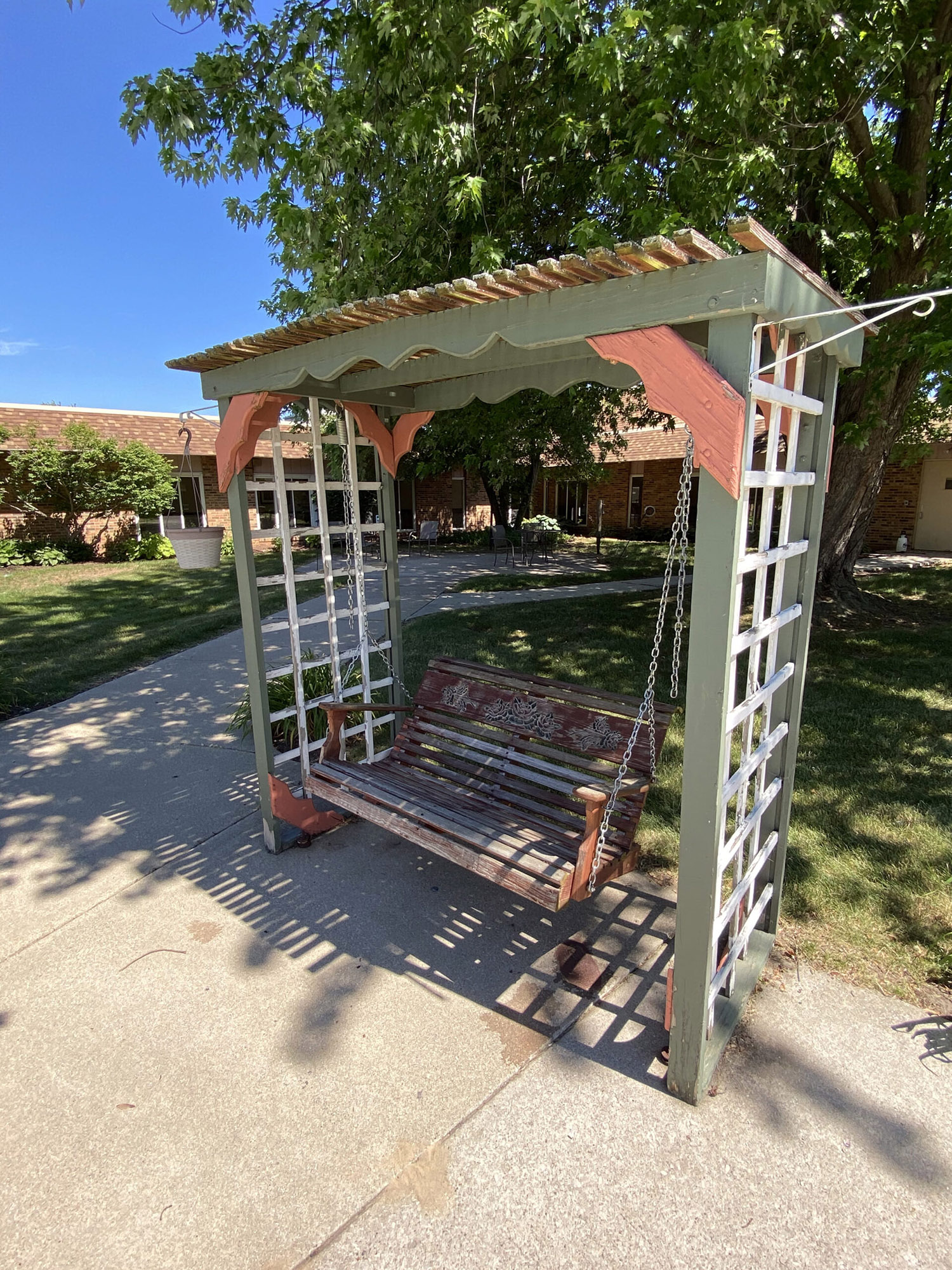 Brickyard Healthcare Portage Care Center exterior patio with swing